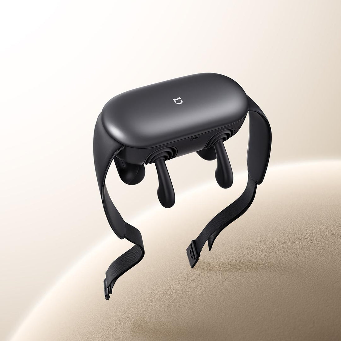 Xiaomi Mijia Smart Shoulder and Neck Massager, full product and straps on a light background