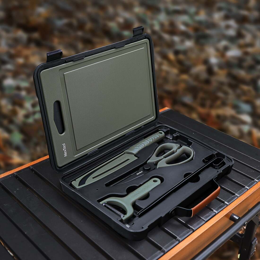 NexTool barbecue tool set organised inside its case at a campsite
