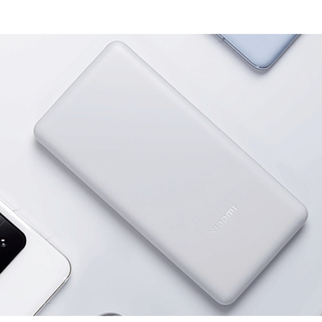 Xiaomi 10000mAh 22.5W Lite power bank with everyday electronic devices