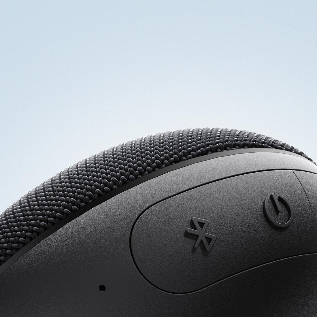 Black Essential speaker Bluetooth and playback controls close-up