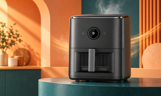 Mijia Smart Steam Air Fryer 7L on a teal counter with subtle steam and warm airflow in an orange and peach kitchen studio