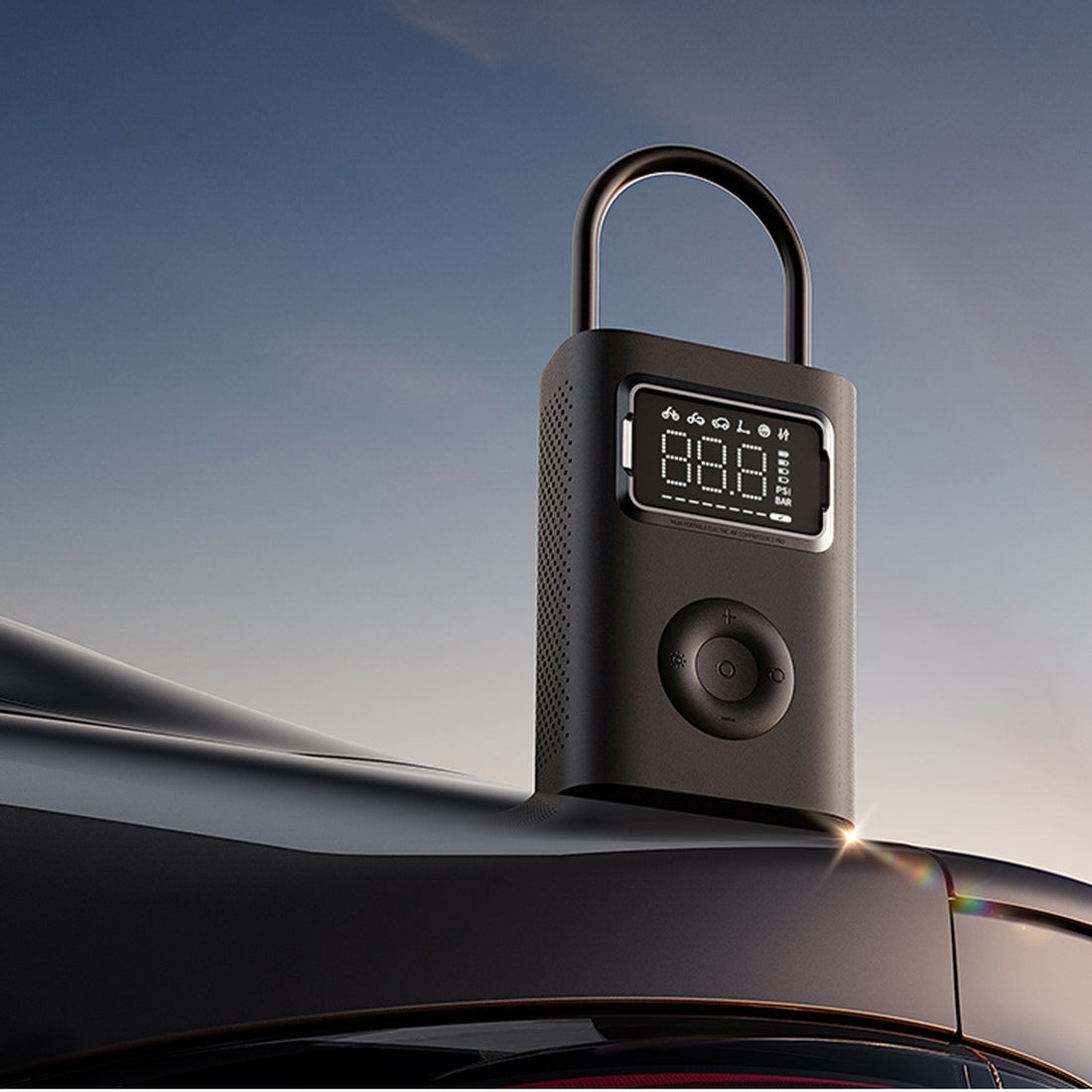 Xiaomi Mijia Air Compressor 2 Pro, complete unit standing on a car, manufacturer illustration