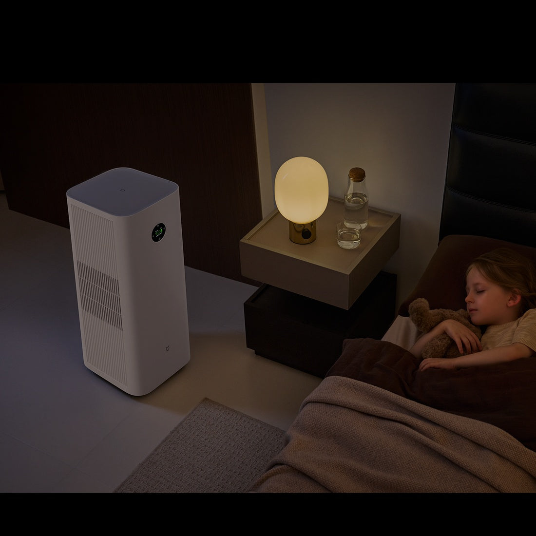 Mijia Smart Air Purifier 6 Plus beside a bed