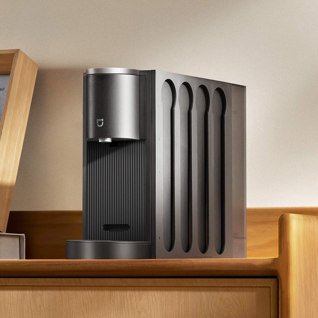 Xiaomi Mijia S1 capsule coffee machine on a kitchen counter