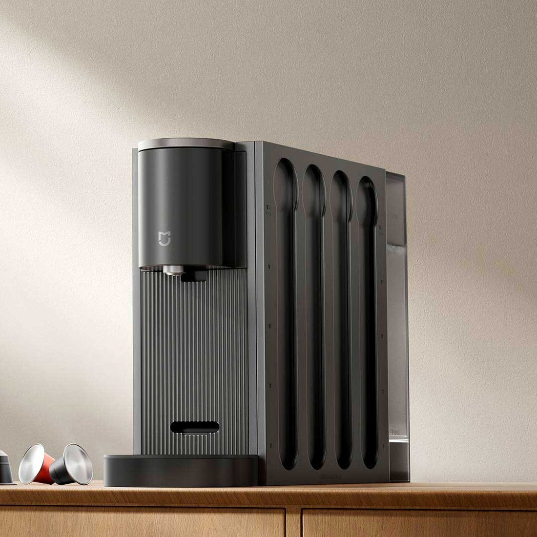 Xiaomi Mijia S1 capsule coffee machine beside a lamp