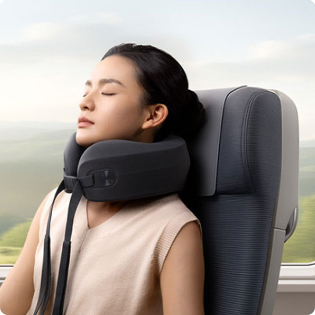 Mijia Smart Neck Pillow Massager worn while seated during travel