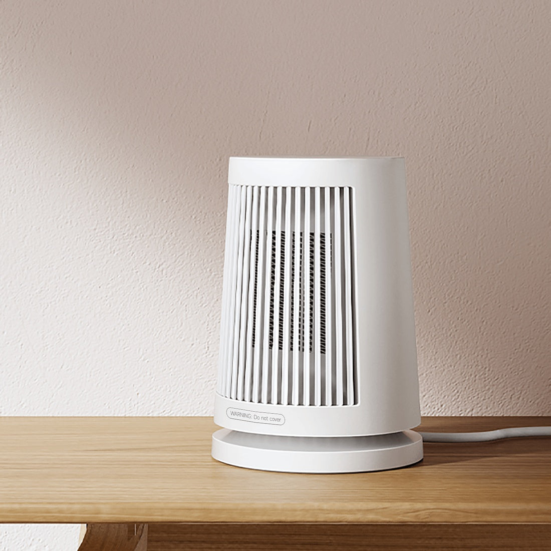 Xiaomi Desktop Heater on a wooden tabletop
