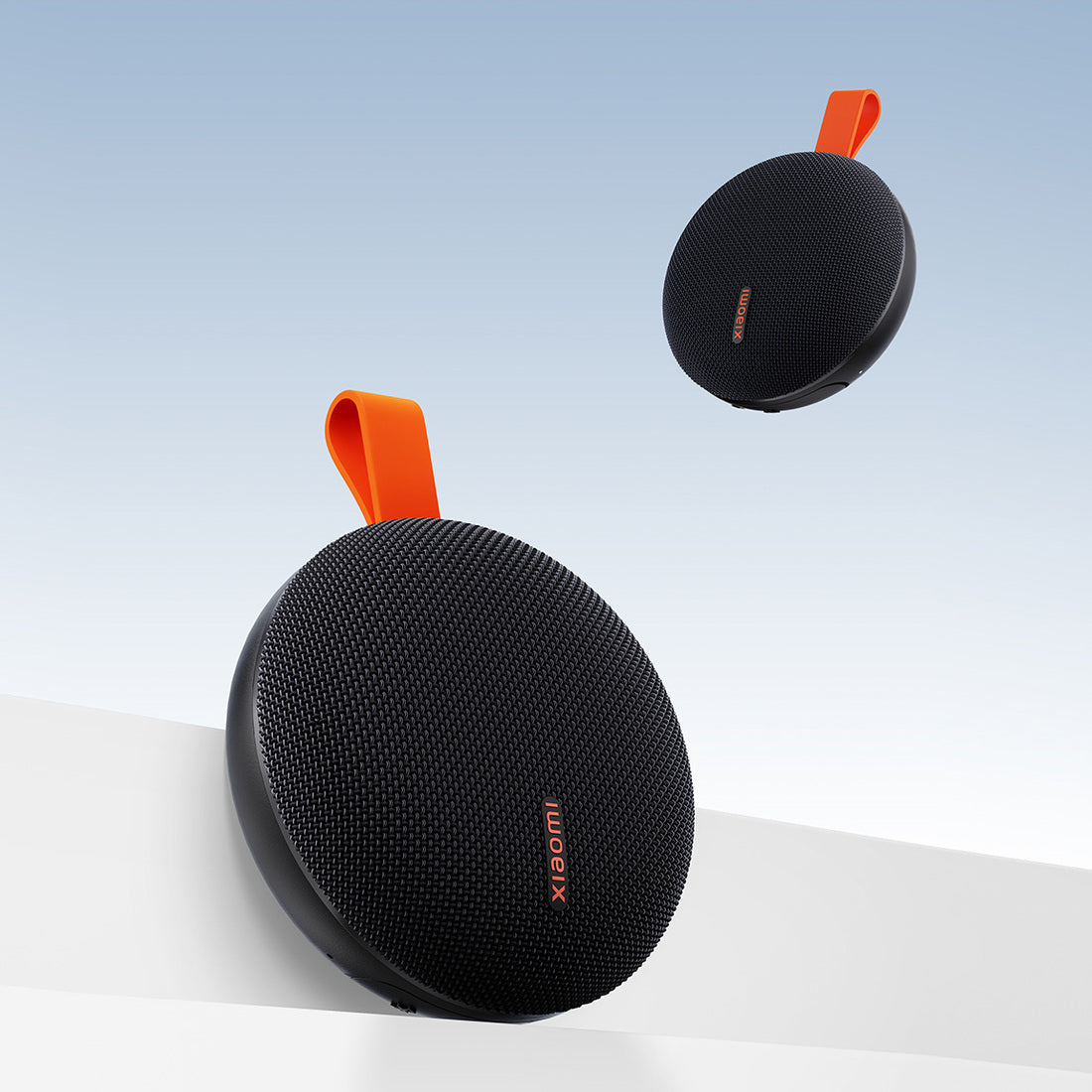 Two black Essential speakers illustrating optional stereo pairing; sold individually