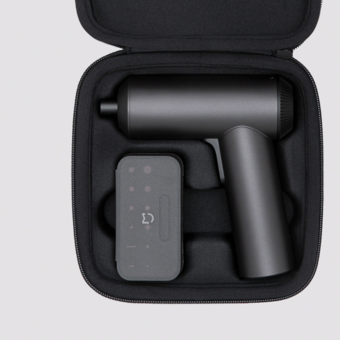 Mi Cordless Screwdriver and bit container in the storage pouch