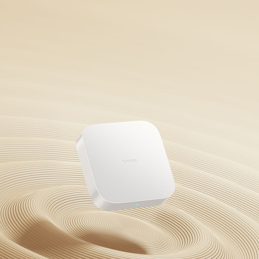 Xiaomi Smart Home Hub 2 white hub on a gold background